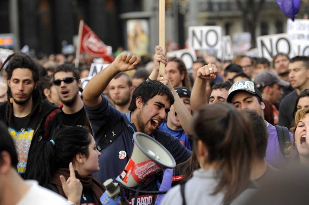 Youngsters shout slogans during a demons