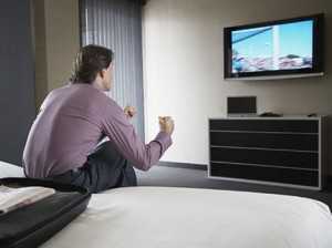 man-watching-tv-lg-93547656