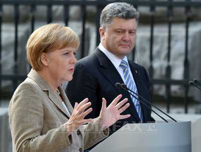 ANGELA MERKEL LA KIEV: <i>“Vreau sa gasesc o cale care sa nu ofenseze Rusia”</i>/ Oficial ucrainean: CONFLICTUL POATE FI REZOLVAT DOAR PE CALE ARMATA/ <b>Biserica ortodoxa distrusa de bombardamente la Donetk</b>/ PRIZONIERI UCRAINIENI UMILITI/ Rusia vrea sa trimita un nou “CONVOI UMANITAR”