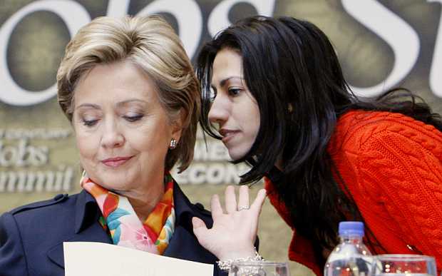 Hillary Rodham Clinton, Huma Abedin...Democratic presidential hopeful, Sen. Hillary Rodham Clinton, D-N.Y., left, has a word with aide Huma Abedin prior to the start of a discussion on jobs, Wednesday, April 2, 2008, during a campaign event at the IBEW Local Union 5 Training Facility in Pittsburgh, Pa. (AP Photo/Charles Dharapak)