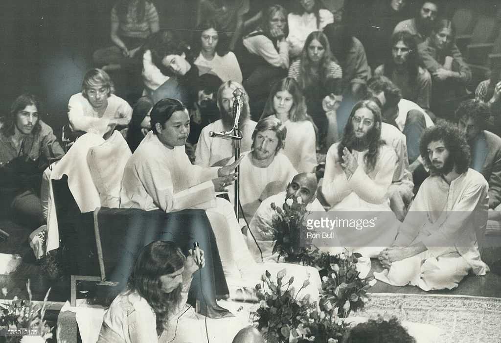 Teenage Yoga teacher Maharaj Ji is surrounded by adherents of the Divine Light Mission from Rochdale College during his first Canadian appearance at Massey Hall on Tuesday. Only 13 now; he began teaching at the age of 8. His father was also a guru and after his death enlightenment is believed to have passed to his son. People's spiritual hunger has led to a growing interest in Toronto in the practice of yoga.